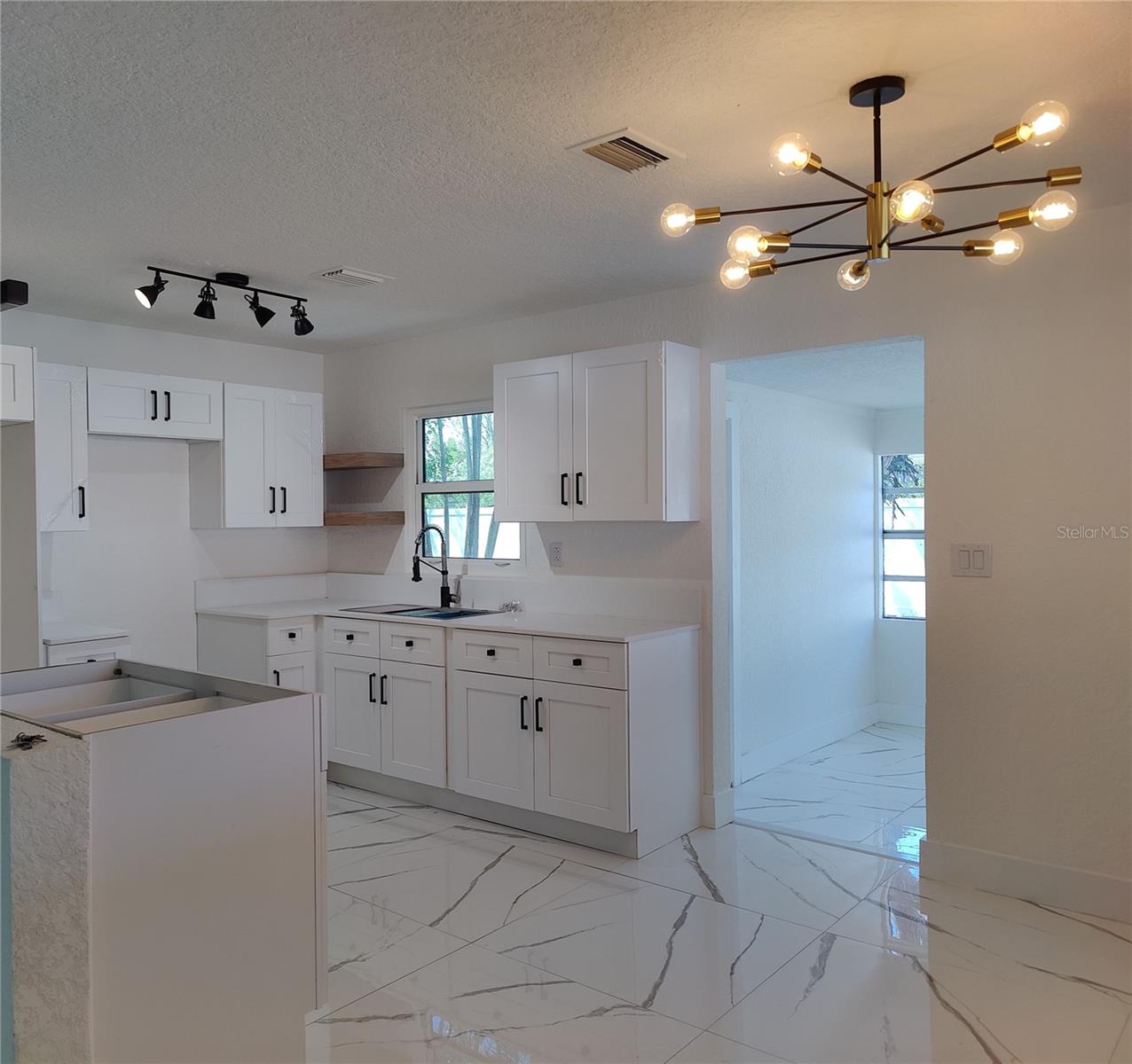 Image 3 of 39 For 7498 Orpine Drive N