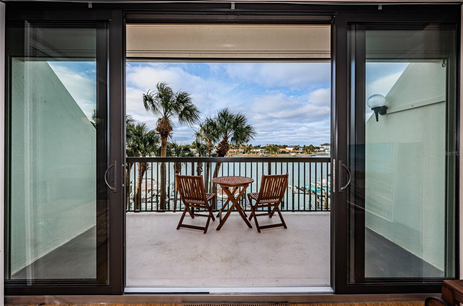 Image 24 of 74 For 9495 Blind Pass Road 205