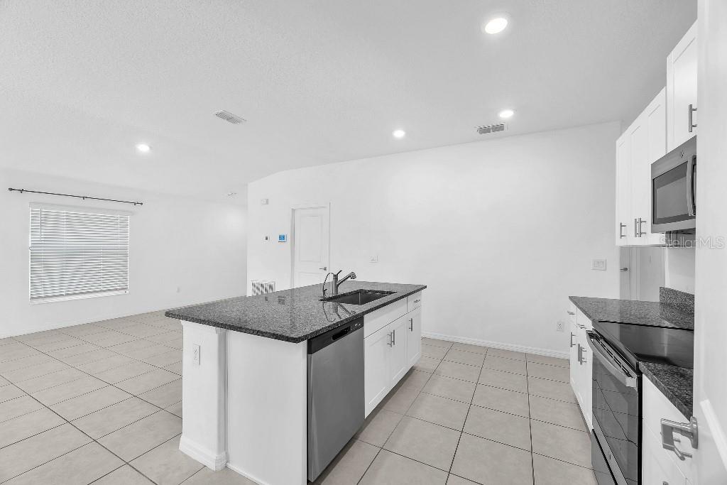 Image 15 of 26 For 5518 Blue Azure Drive
