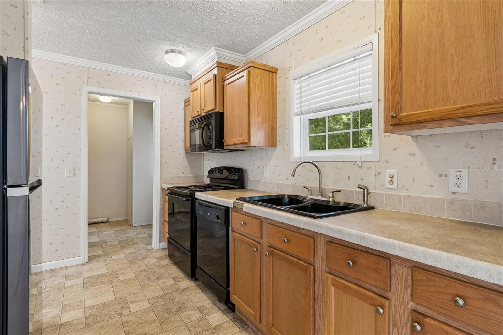Image 14 of 66 For 6735 Ravenwood Street