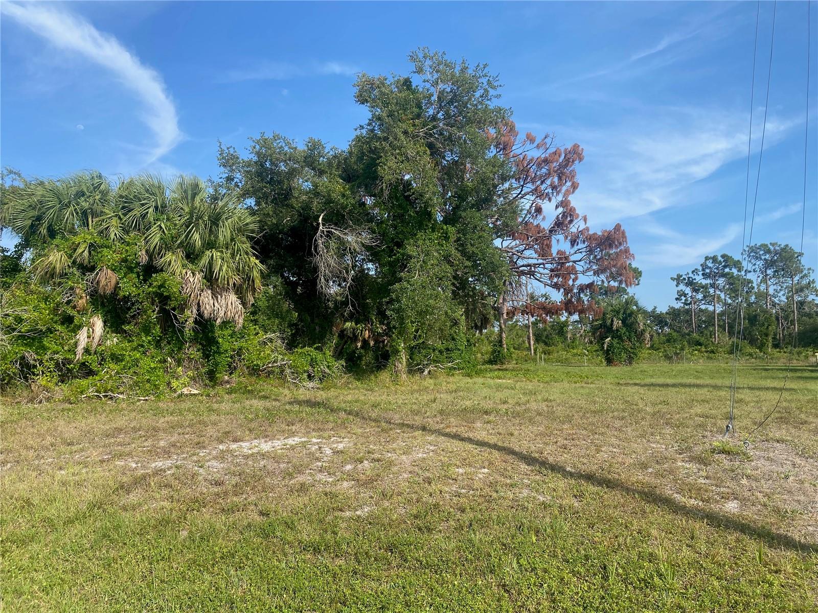 Listing Details for 1055 & 1057 Boundary Boulevard, ROTONDA WEST, FL 33947