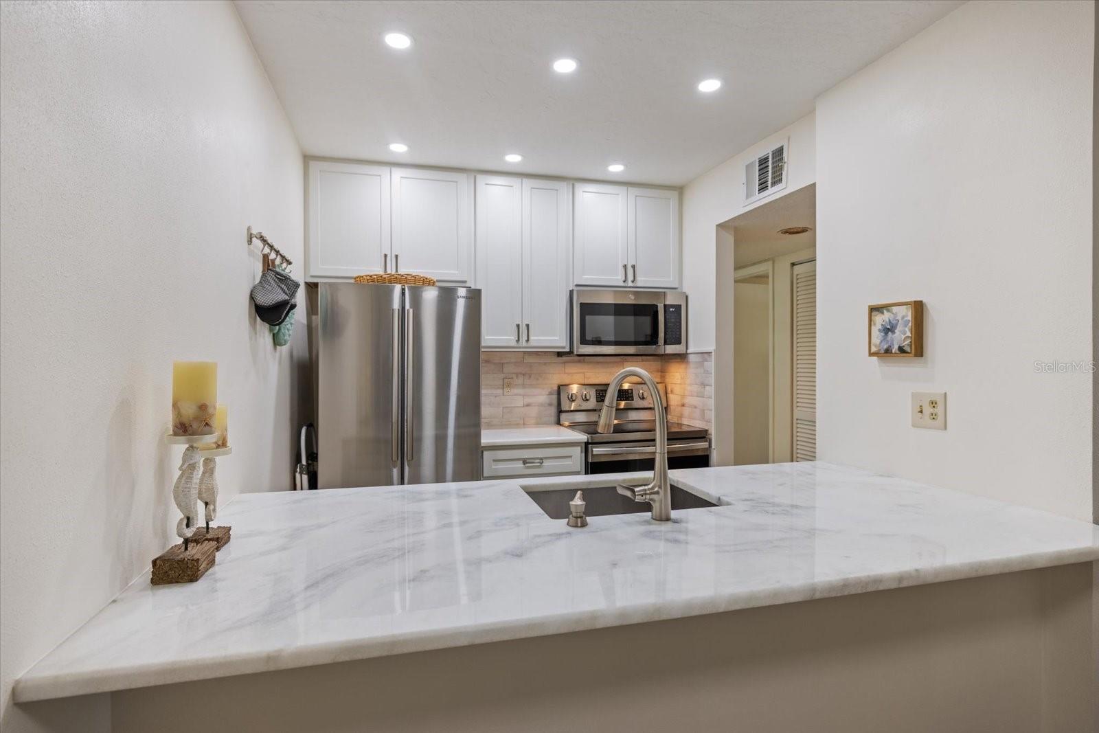 Image 5 of 42 For 622 Bird Bay Drive S 207