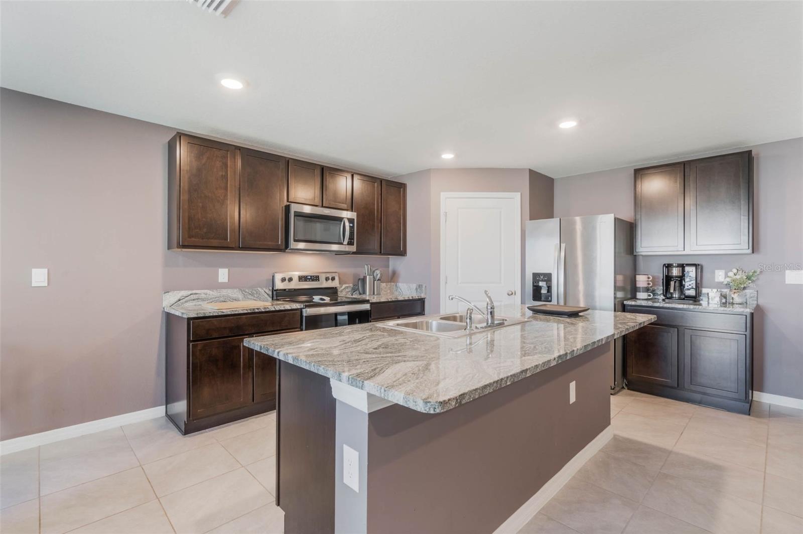 Image 13 of 41 For 8595 Triumph Circle