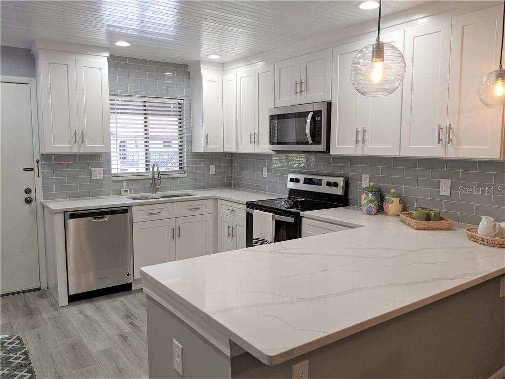 Image 2 of 20 For 1634 Stickney Point Road 1634-2