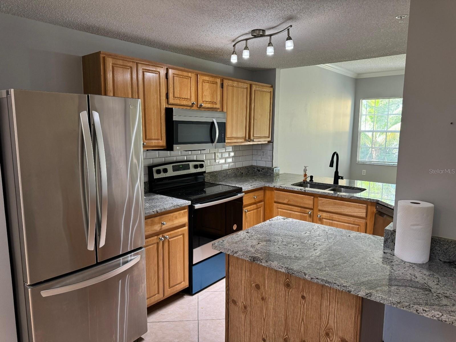Image 2 of 27 For 5600 Bentgrass Drive 8-103