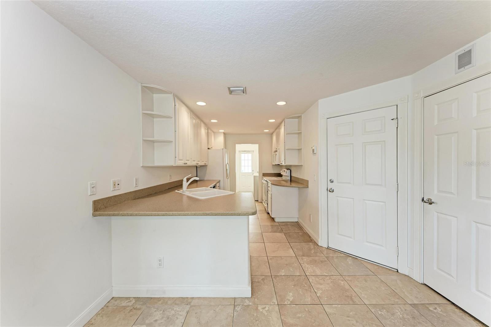 Image 9 of 44 For 1501 Napoli Drive W 1501