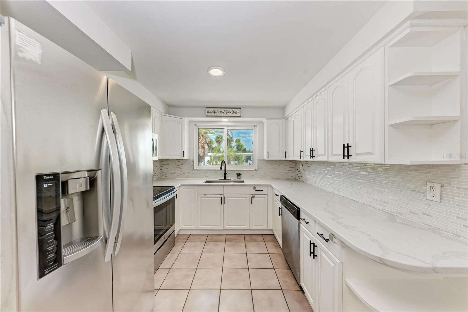 Image 11 of 36 For 6036 Hopkins Drive N