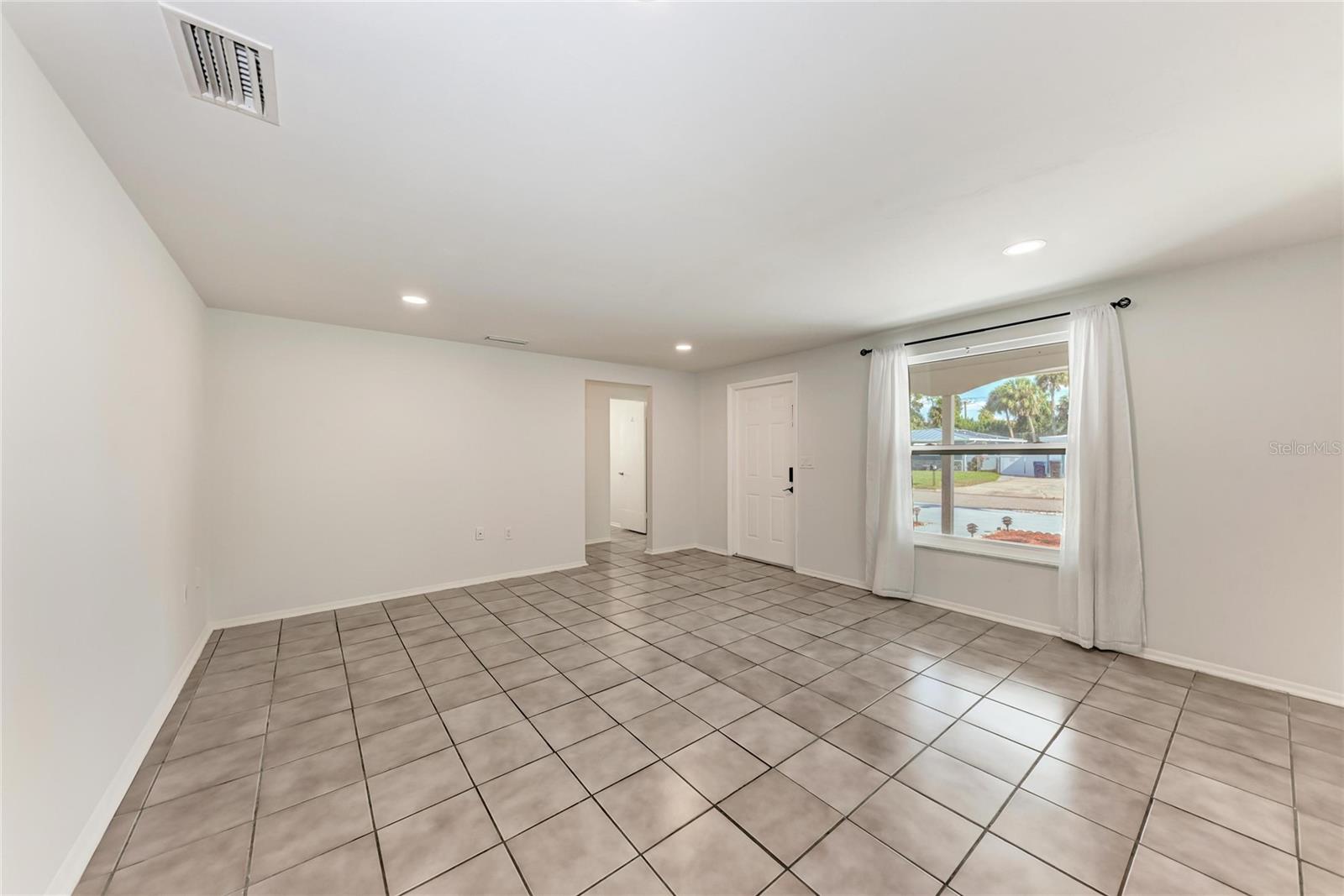 Image 8 of 36 For 6036 Hopkins Drive N