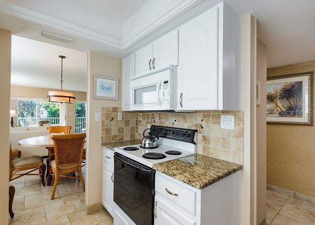 Image 16 of 39 For 5962 Midnight Pass Road 129