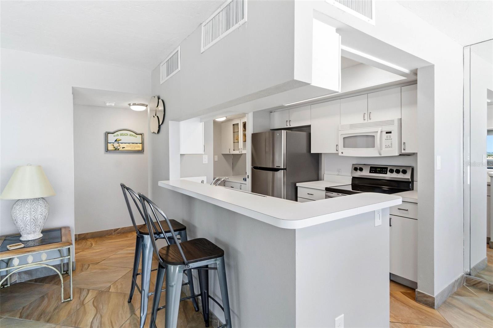 Image 12 of 39 For 5966 Midnight Pass Road G113