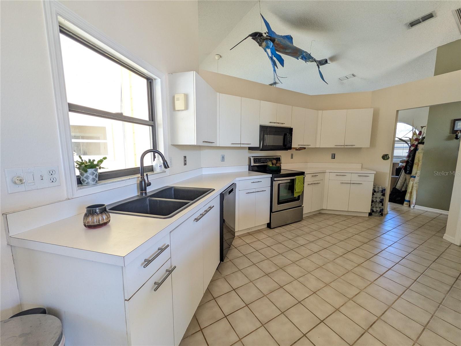 Image 5 of 26 For 8432 Palm Lakes Court