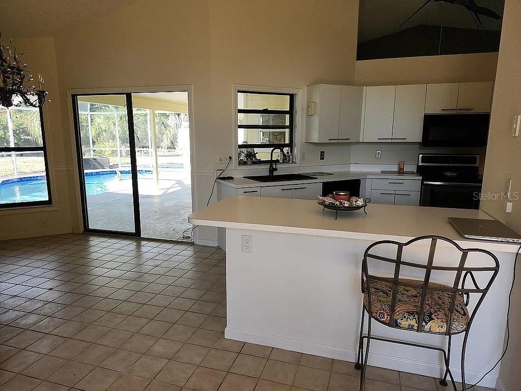 Image 6 of 26 For 8432 Palm Lakes Court