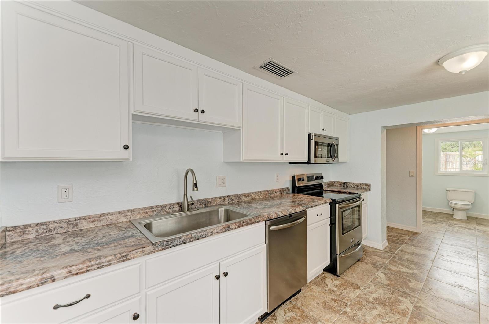 Image 18 of 39 For 7008 12th Avenue Nw