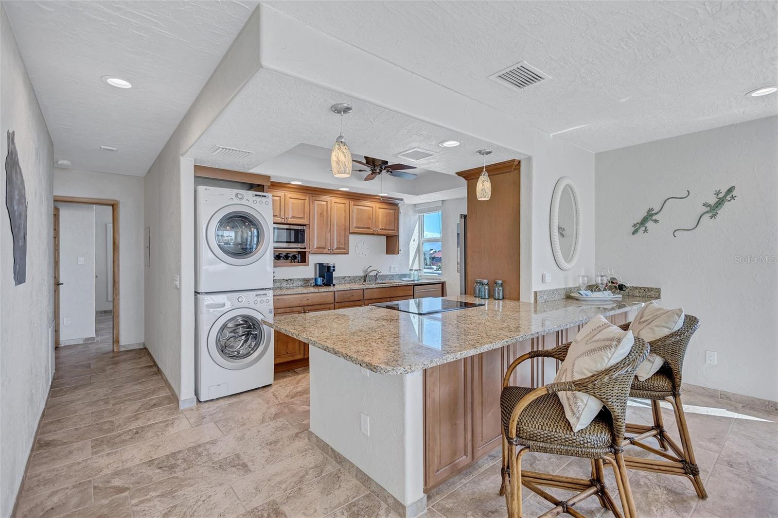 Image 23 of 75 For 6140 Midnight Pass Road 101