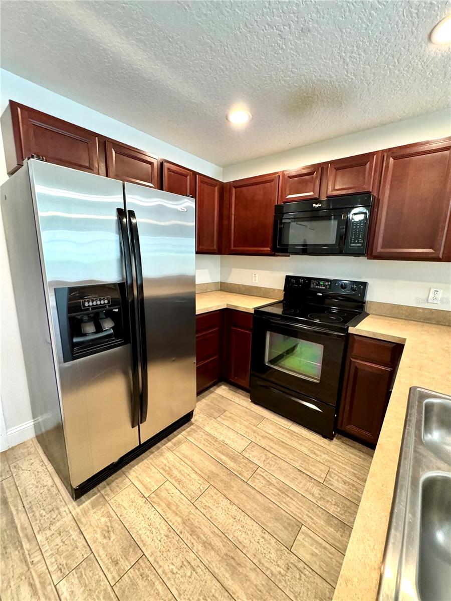 Image 6 of 30 For 13418 Tea Rose Way 103