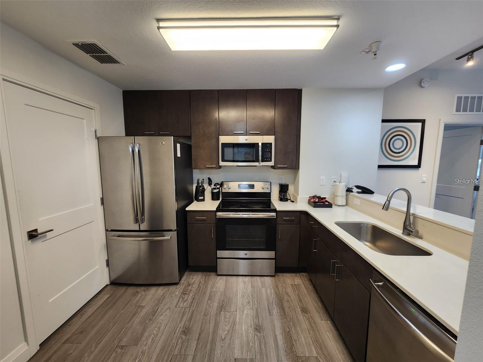 Image 3 of 43 For 14501 Grove Resort Avenue 3218