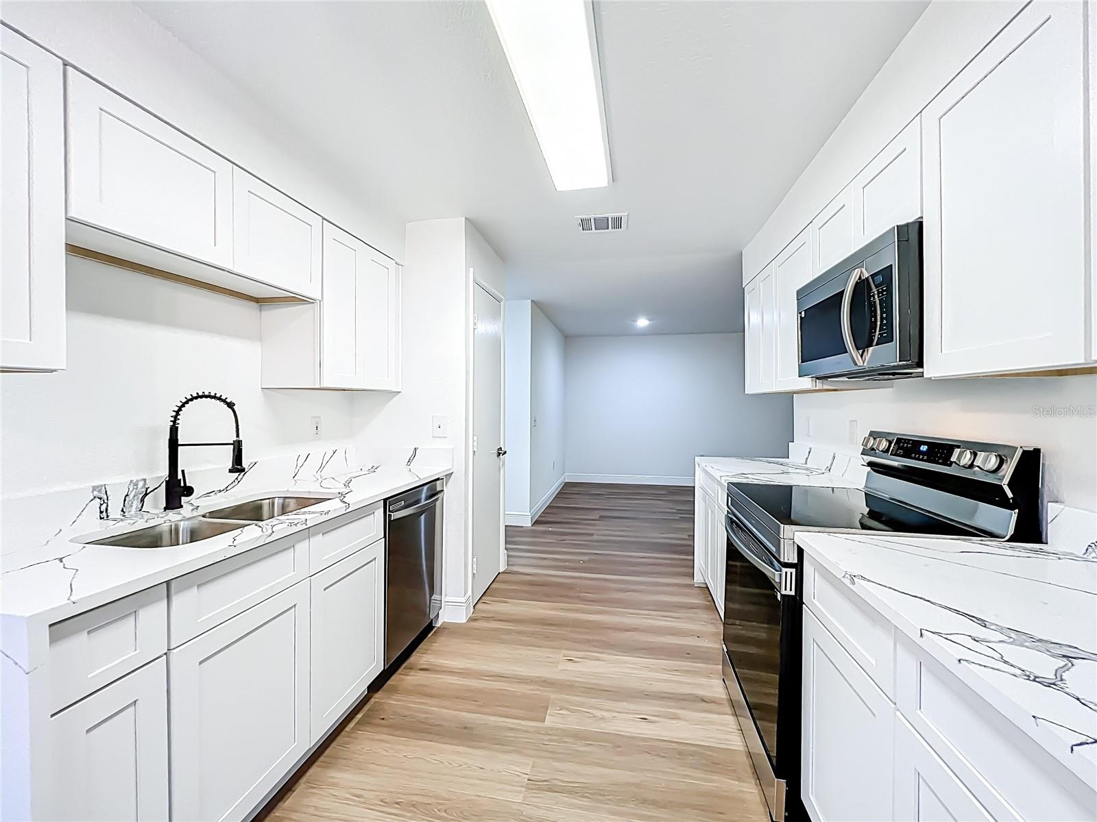 Image 16 of 42 For 7713 Sugar Bend Drive 7713