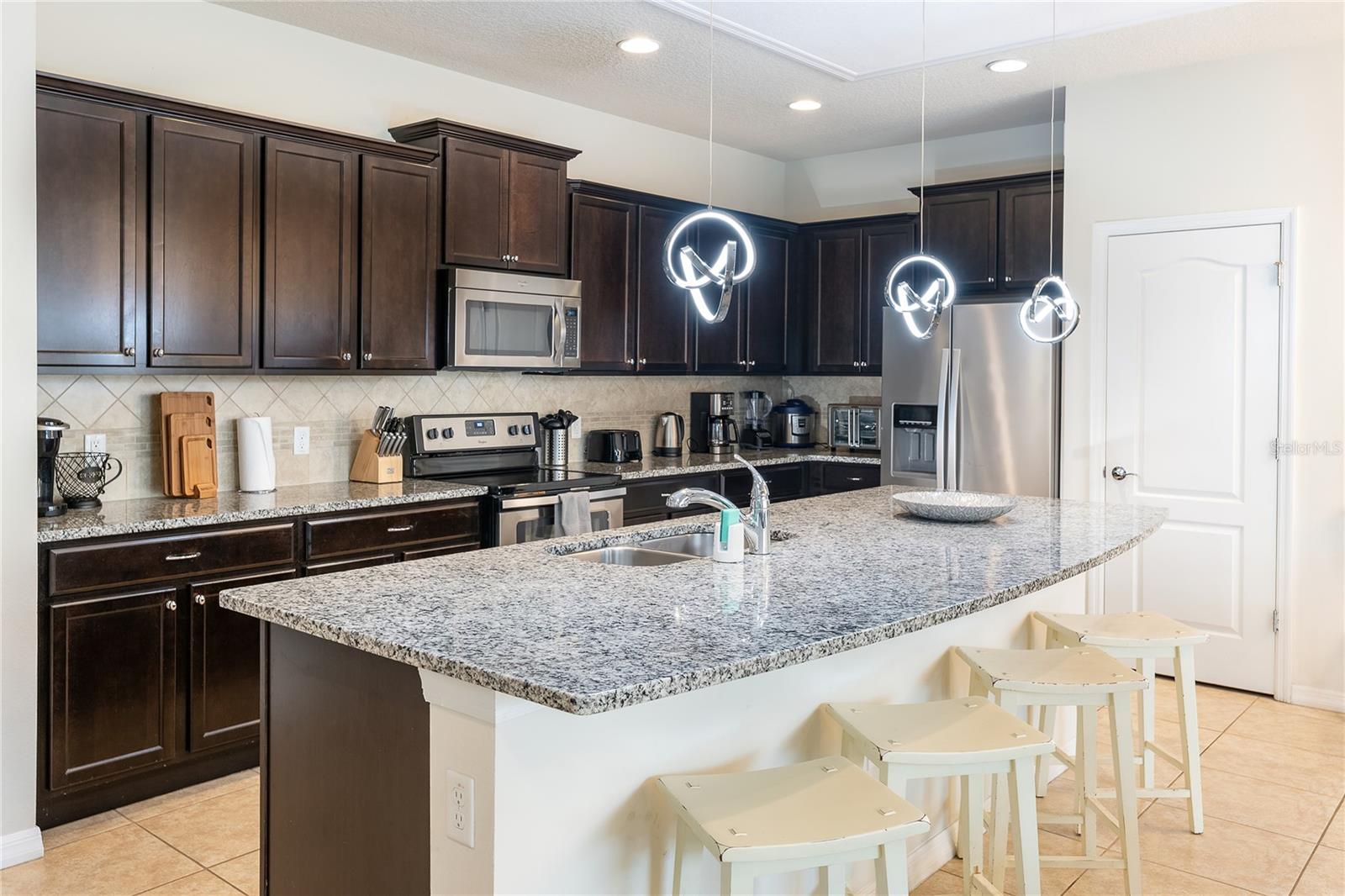 Image 3 of 50 For 9047 Rhodes Street