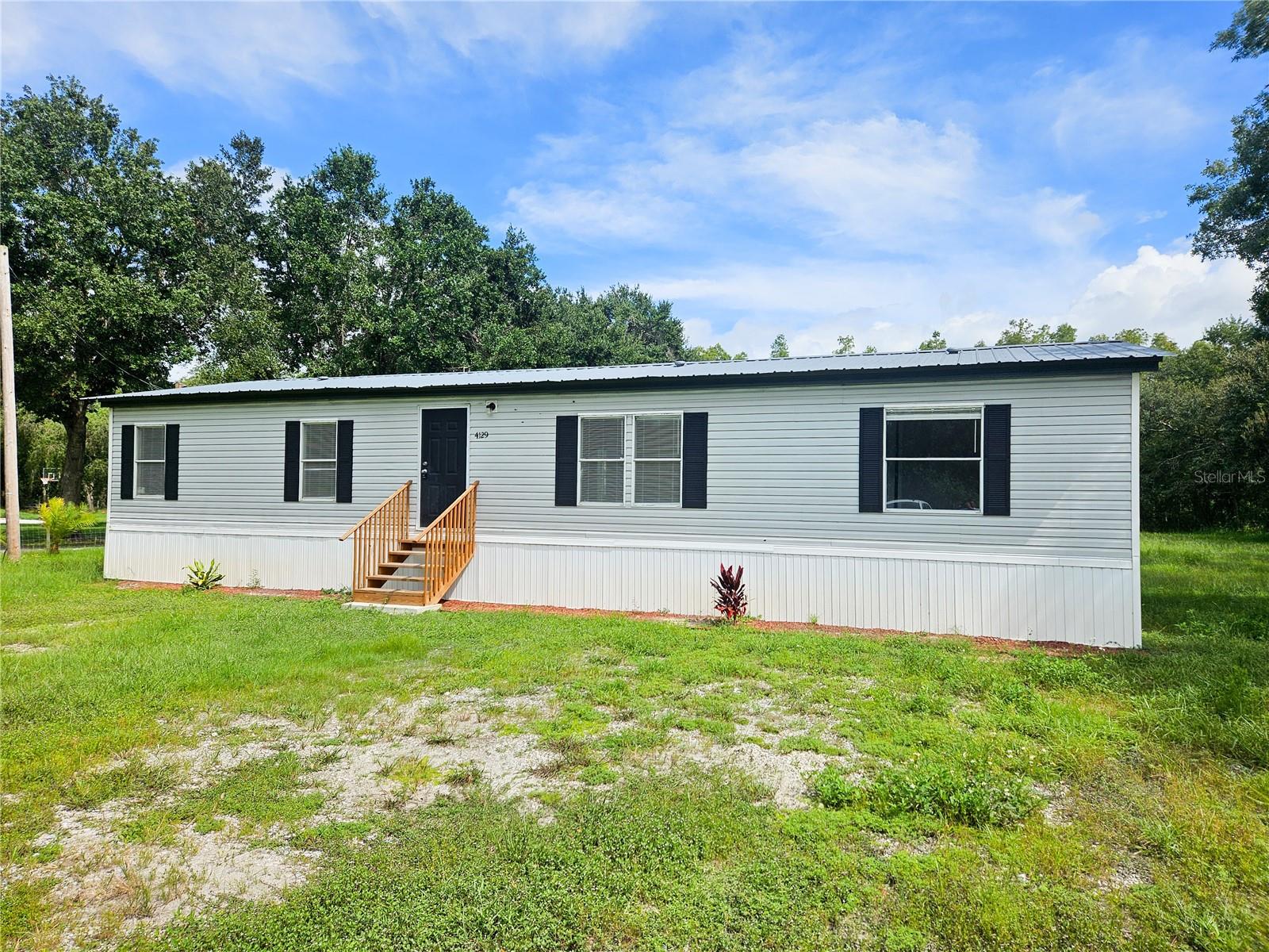 Image 4 of 33 For 4129 Woodsridge Drive