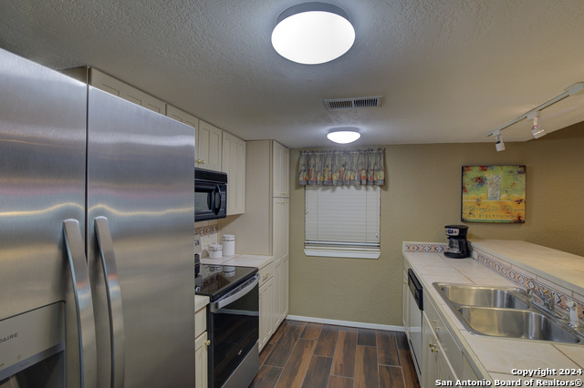 Image 16 of 42 For 211 T Bar M Dr  211