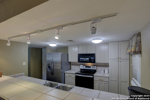 Image 19 of 42 For 211 T Bar M Dr  211