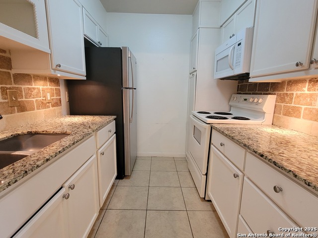 Image 8 of 14 For 8702 Village Dr  204