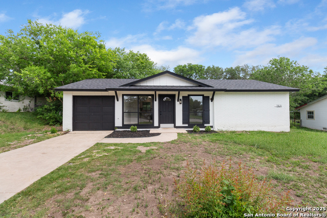 Listing photo id 0 for 7621 Strolling Ln