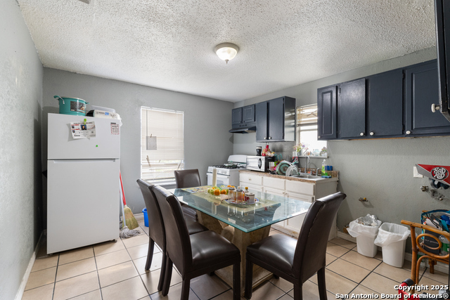 Image 11 of 15 For 9007 Garnett Ave