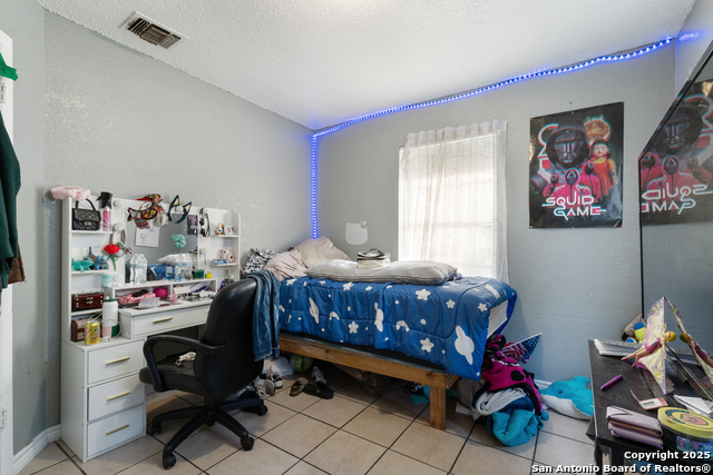 Image 13 of 15 For 9007 Garnett Ave