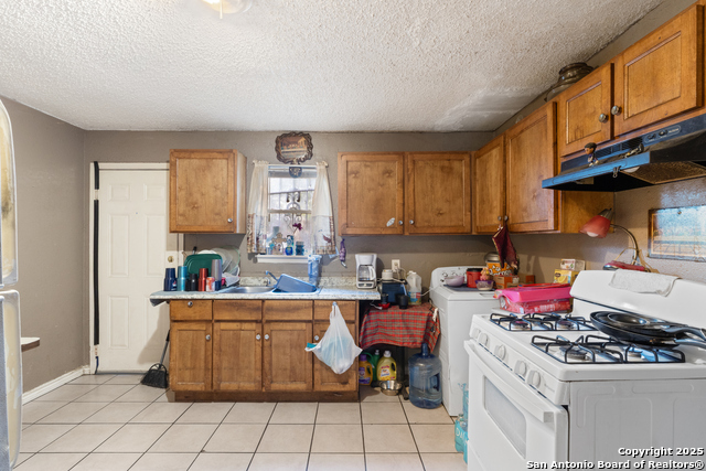 Image 5 of 15 For 9007 Garnett Ave