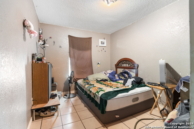 Image 6 of 15 For 9007 Garnett Ave