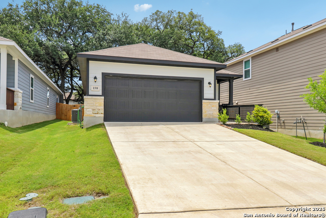 Listing photo id 1 for 158 Canopy Oak
