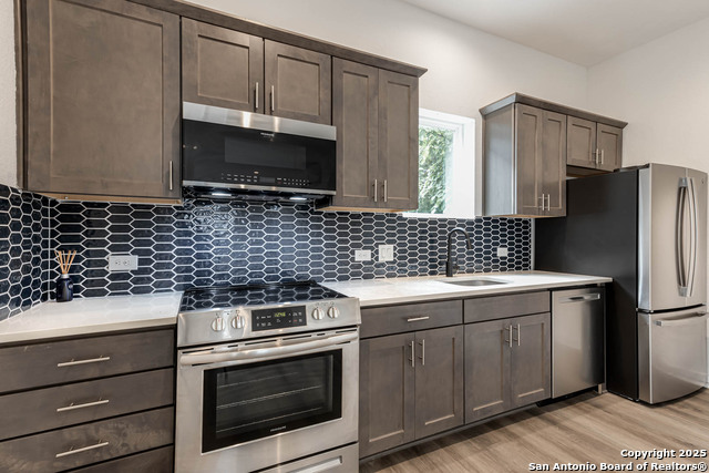 Image 12 of 32 For 210 Poplar St W 108