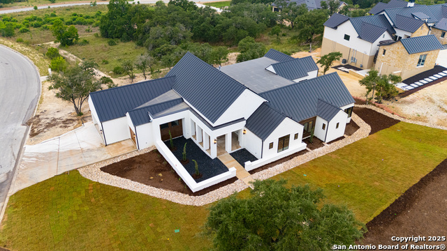 Listing photo id 0 for 9527 Midsomer Place