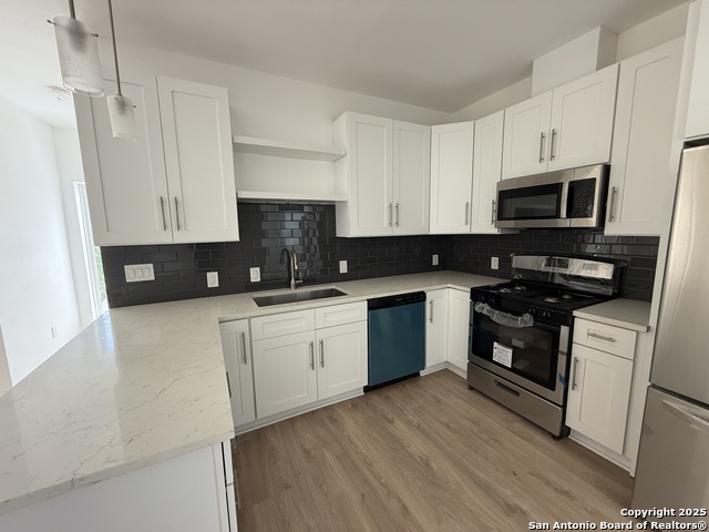 Image 8 of 18 For 715 Ogden  104