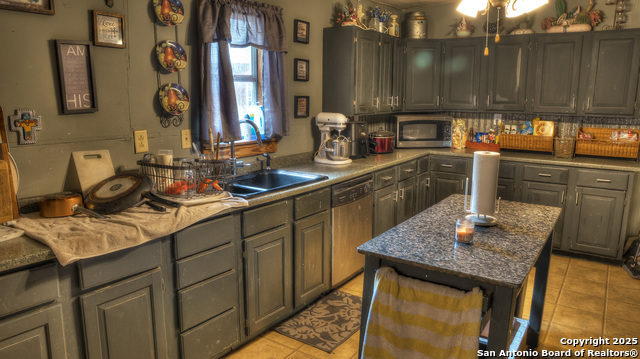 Image 12 of 57 For 704 Alex Auld