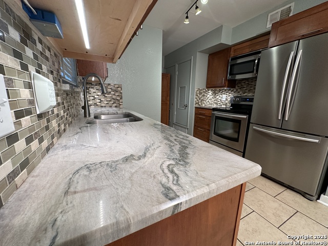 Image 8 of 24 For 105 Silver Sands Dr W 105a