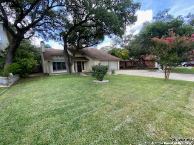 Listing photo id 0 for 9307 Woodheather St