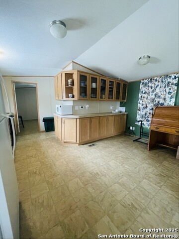 Listing photo id 6 for 102 Fourth St & 20010 Fm 471 S