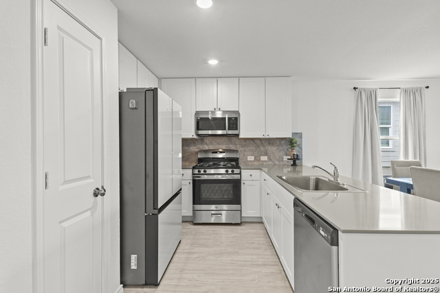 Image 11 of 32 For 7022 Serf Pl