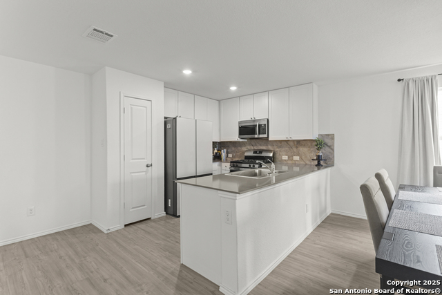Image 12 of 32 For 7022 Serf Pl