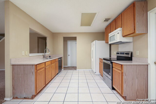 Image 12 of 26 For 9107 Gambier Dr