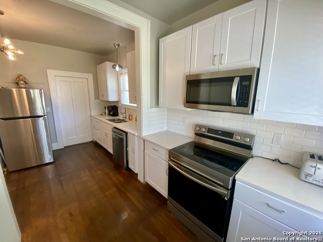 Image 18 of 36 For 1439 Highland Blvd E Downstairs