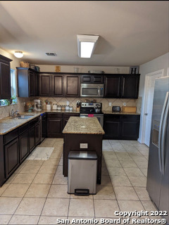 Image 6 of 29 For 1211 Devine Dr.