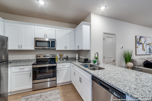 Image 5 of 12 For 7552 Magnolia Village 101