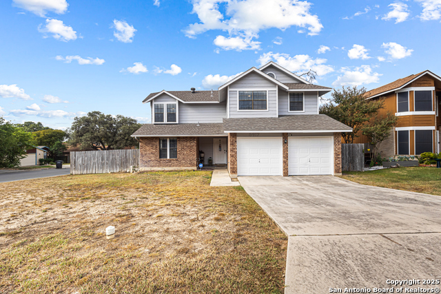 Listing photo id 0 for 5617 Timber Rain