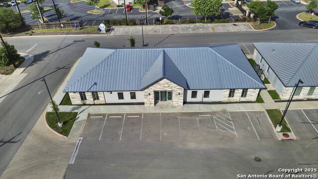 Listing photo id 0 for 7323 N Loop 1604  301 & 303