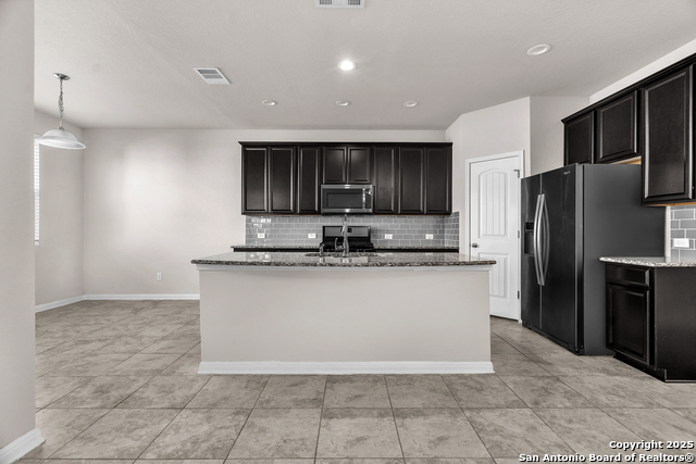 Image 13 of 50 For 6815 Melody Stone