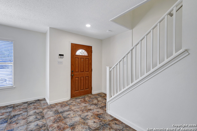 Listing photo id 0 for 10211 Windstone Creek