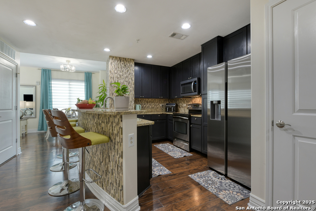 Image 5 of 37 For 215 Center St. N 206